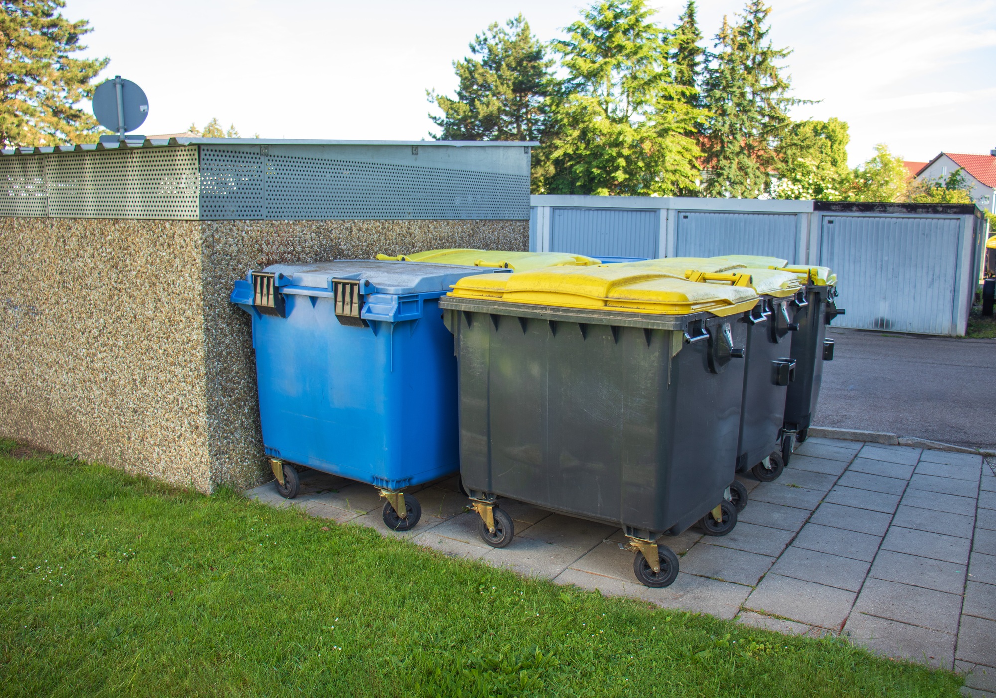 trash cans at the entrance, waste sorting in Europe